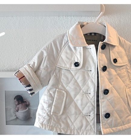 Tom’s new burberry clothes